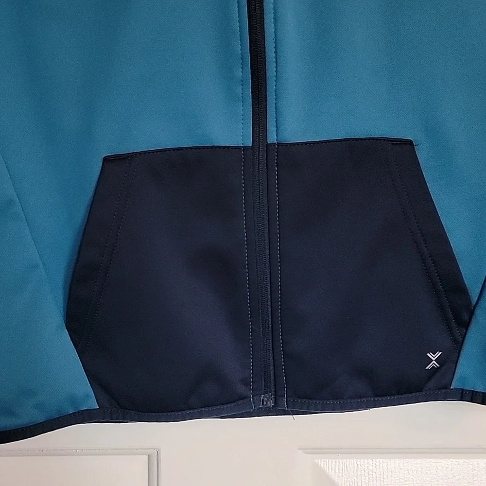 Xersion, boys large (14-16) long sleeved jacket with front zipper and hood.